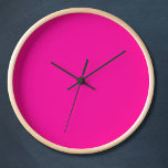 Neon Pink Solid Color Clock<br><div class="desc">A vibrant and electrifying pink that is full of energy and excitement.Reminiscent of neon signs illuminating a bustling city nightlife or the vivid hues of tropical flowers,  this color is bold,  playful,  and unapologetically lively.Perfect for making a striking statement.</div>