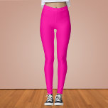 Neon Pink Solid Color Leggings<br><div class="desc">A vibrant and electrifying pink that is full of energy and excitement.Reminiscent of neon signs illuminating a bustling city nightlife or the vivid hues of tropical flowers,  this color is bold,  playful,  and unapologetically lively.Perfect for making a striking statement.</div>