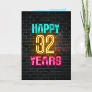 Neon sign on brick for 32nd birthday card