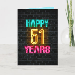 Neon sign on brick for 51st birthday card