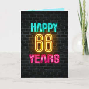 Neon sign on brick for 66th birthday card
