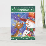 Nephew, Cute Reindeer and Snowman Holiday Card<br><div class="desc">For Nephew. A really cute,  colorful Christmas card. The illustration shows a sweet baby deer with big open eyes and a fun snowman in a huge hat looking fondly,  nose to nose,  at each other. They are set against a blue watercolor sky and snow is falling around them.</div>