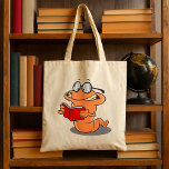 Nerdy Bookworm Reading A Book Tote Bag<br><div class="desc">Carry your essentials in style with this adorable cartoon bookworm tote bag. Featuring a cute nerdy worm with glasses reading a red book, this fun design is perfect for book lovers, teachers, students, and librarians. Made from durable, eco-friendly material, it’s ideal for trips to the library, school, or bookstore. The...</div>