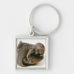 Netsuke carved in the shape of a mermaid key ring