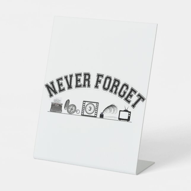 Never Forget – Vintage Essentials Pedestal Sign (Front)