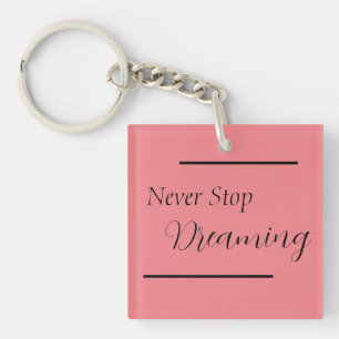 "Never Stop Dreaming" Phrase Black Lettering  Key Ring
