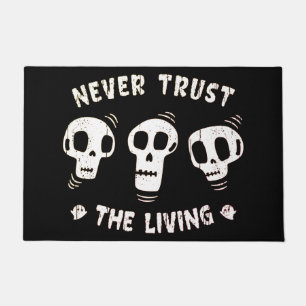 Never Trust The Living: Wise Skulls Halloween Doormat
