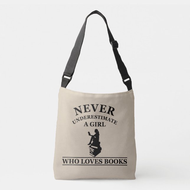 never underestimate a girl who loves books crossbody bag (Front)