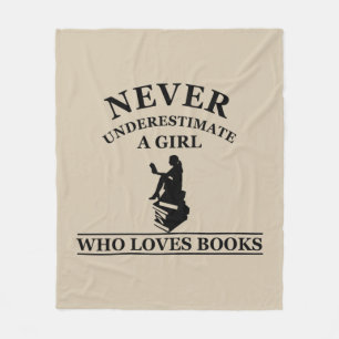 never underestimate a girl who loves books fleece blanket