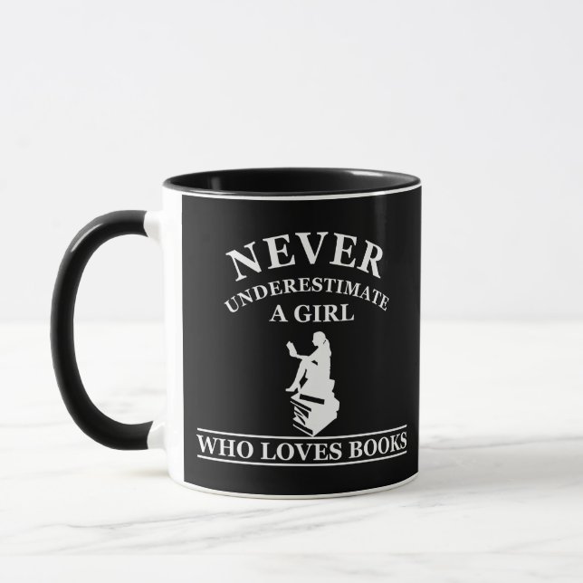 never underestimate a girl who loves books mug (Left)