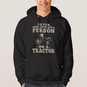 Never Underestimate A Person On A Tractor  Farming Hoodie