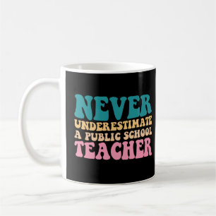 Never Underestimate A Public School Teacher Women Coffee Mug