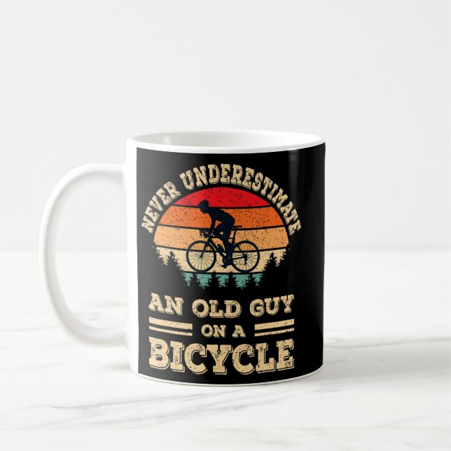 Never Underestimate An Old Guy On A Bicycle Funny  Coffee Mug (Left)