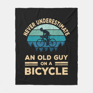 Never Underestimate An Old Guy On A Bicycle Funny  Fleece Blanket