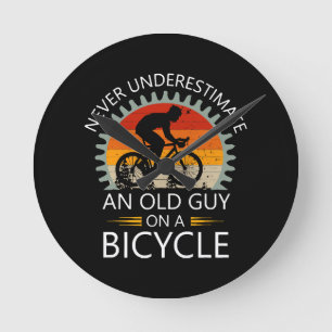 Never Underestimate An Old Guy On A Bicycle Round Clock