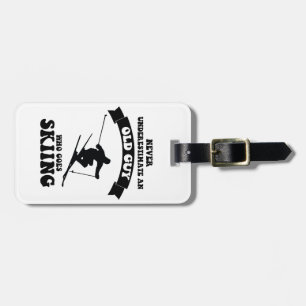 Never underestimate an old guy who goes skiing luggage tag