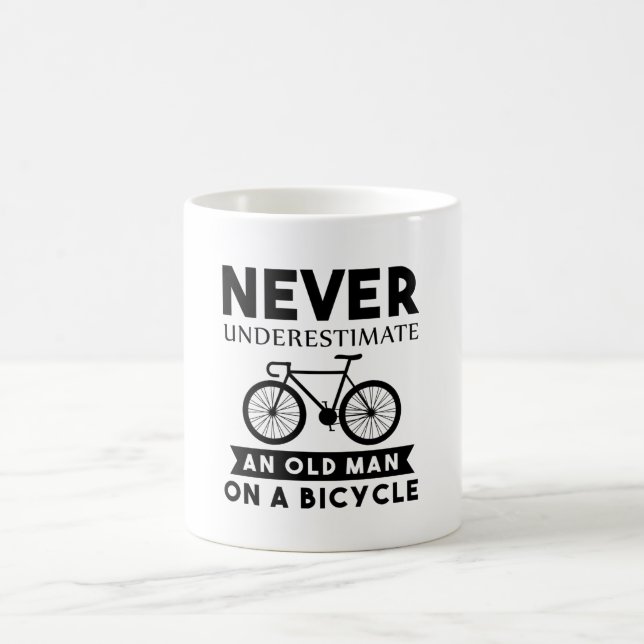 Never Underestimate an Old man on a Bicycle Coffee Mug (Center)