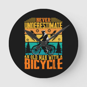 Never Underestimate An Old Man On A Bike Round Clock