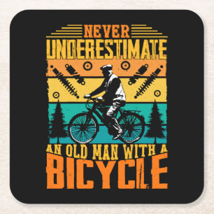 Never Underestimate An Old Man On A Bike Square Paper Coaster