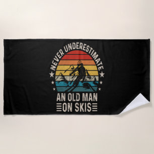Never Underestimate An Old Man On Skis Retro Beach Towel