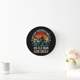 Never Underestimate An Old Man On Skis Retro Round Clock