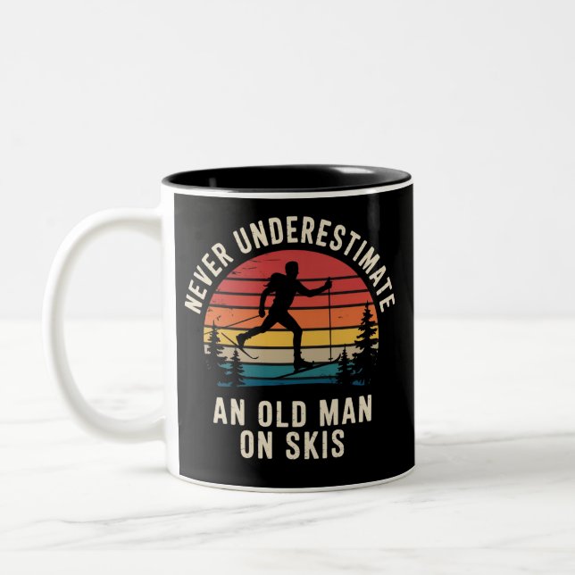 Never Underestimate an Old Man on Skis Skiing Trip Two-Tone Coffee Mug (Left)