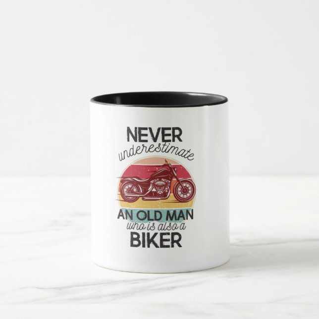 Never underestimate an old man who is also a biker mug (Center)