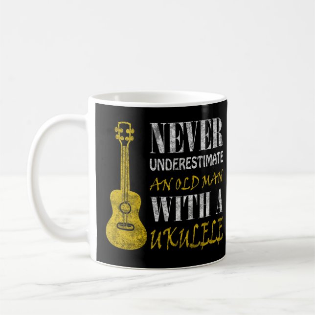 Never underestimate an old man with a ukuleleThis  Coffee Mug (Left)