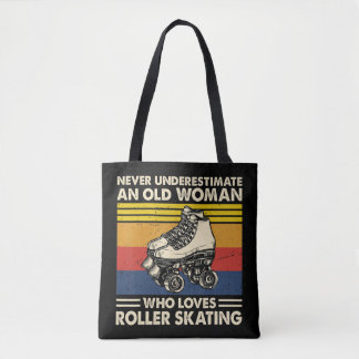 Never underestimate an old woman loves roller skat tote bag