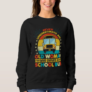Never Underestimate An Old Woman Who Drives A Scho Sweatshirt