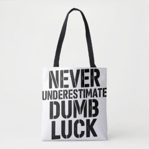 "Never Underestimate Dumb Luck" Saying Tote Bag
