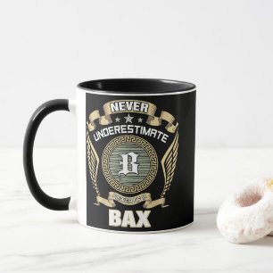 NEVER_UNDERESTIMATE_POWER_OF_A_BAX MUG