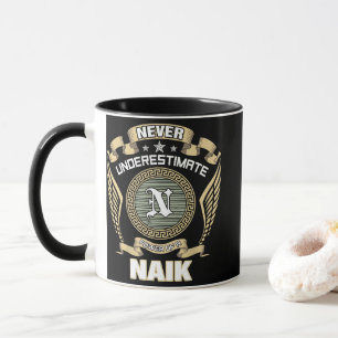 NEVER_UNDERESTIMATE_POWER_OF_A_NICOLA MUG