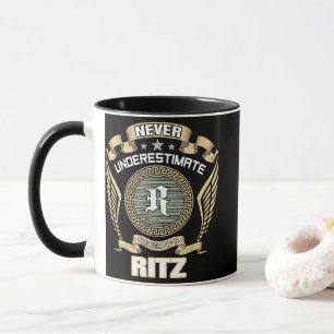 NEVER_UNDERESTIMATE_POWER_OF_A_RITZ MUG