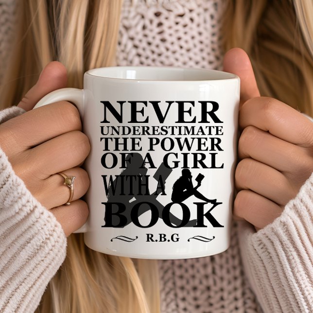 Never underestimate the power of a girl with book mug (Creator Uploaded)