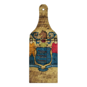 New Jersey State Flag on Old Wood Grain Cutting Board