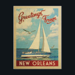 New Orleans Sailboat Vintage Travel Louisiana Postcard<br><div class="desc">This Greetings From New Orleans Louisiana vintage travel nautical design features a boat sailing on the water with seagulls and a blue sky filled with gorgeous puffy white clouds.</div>