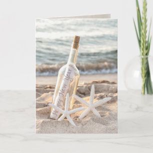 New year message in a bottle and starfish card