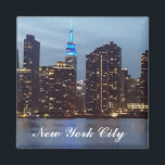 NEW YORK SKYLINE IN BLUE MAGNET<br><div class="desc">Colorful Refrigerator Magnet Featuring The Empire State Building Lit  Up In Blue And The New York City Skyline At Dusk</div>