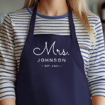 Newlywed Bride Personalised Navy Blue Apron<br><div class="desc">For the bride and groom, this navy blue apron features "Mrs." in a modern script font along with a last name and established date. This is a perfect bridal shower or wedding gift. These Mrs. and Mr. aprons are available in a variety of colours and can be also customised to...</div>