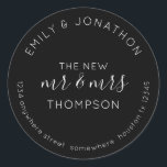 Newlyweds Return Name Address Black Classic Round Sticker<br><div class="desc">A fully customisable typographical design in classic black with white text with your names curved above and your return address curved below and text in the middle The New Mr and Mrs and your married name. All the text can be easily personalised. You can also change background and text colours...</div>