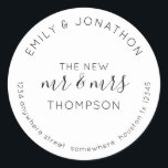 Newlyweds Return Name Address Black White  Classic Round Sticker<br><div class="desc">A modern fully customisable typographical design with your names curved above and your return address curved below and text in the middle The New Mr and Mrs And your married name in black on a white background. All the text can be easily personalised. You can also change background and text...</div>