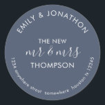 Newlyweds Return Name Address Dusty Navy Blue Classic Round Sticker<br><div class="desc">Newlyweds Return Name Address Dusty Navy Blue> A modern fully customisable typographical design with your names curved above and your return address curved below and text in the middle The New Mr and Mrs And your married name on a dusty navy blue background. All the text can be easily personalised....</div>