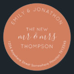 Newlyweds Return Name Address Terracotta  Classic Round Sticker<br><div class="desc">A modern fully customisable typographical design with your names curved above and your return address curved below and text in the middle The New Mr and Mrs And your married name in cream on a terracotta background. All the text can be easily personalised. You can also change background and text...</div>