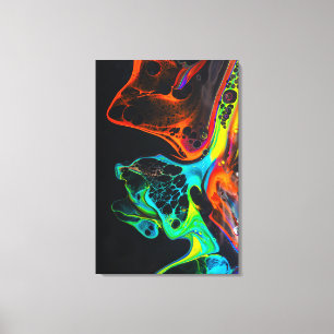 Nice colourful mix of neon paints on black surface canvas print
