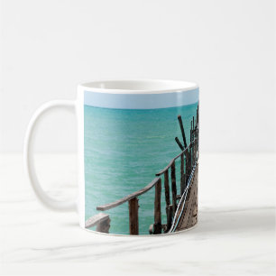Nice wooden bridge with blue sea background at Sam Coffee Mug