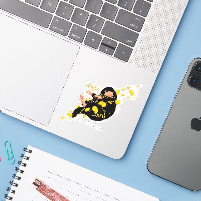 Niffler Floating With Gold (Laptop w/ iPhone)