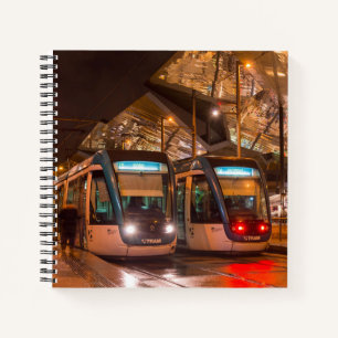 Night image of Barcelona trams in rain. Spain. Notebook