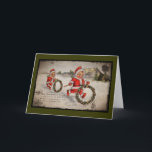 Nimbly Nicks with Holly Wreaths Holiday Card<br><div class="desc">Little elf-like people in bright red snowsuits roll holly wreaths through the snow.  Fun images from the 1920's</div>