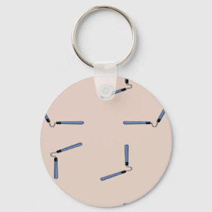 Ninja nunchaku on brown key ring
